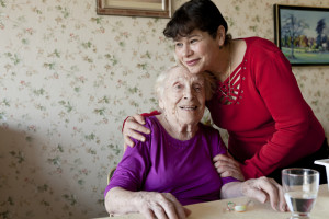caregivers looking after a senior