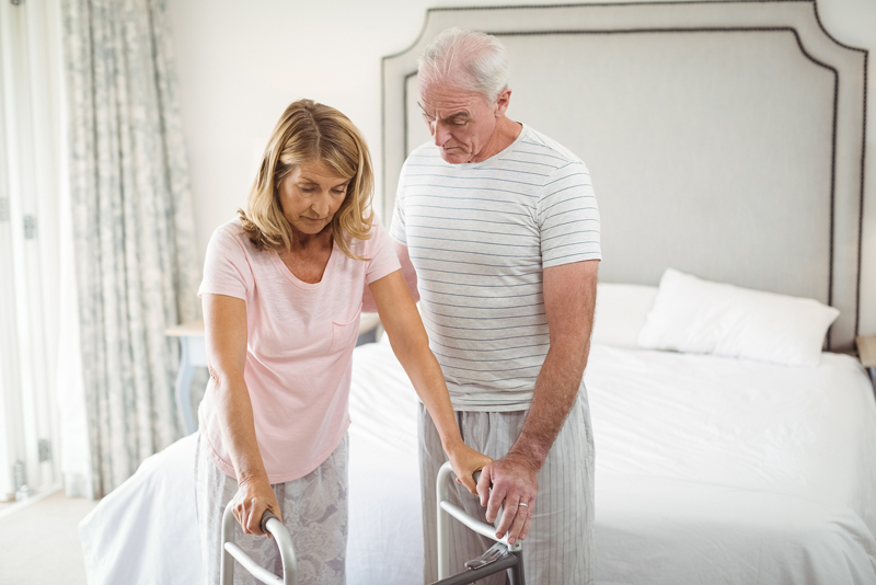 senior man and women coping with health issues